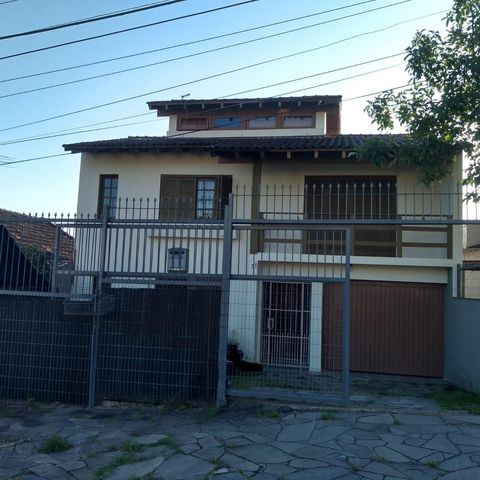Casa à venda com 200m², 4 quartos e 3 vagas Casa à venda com 200m², 4 quartos e 3 vagasFachada