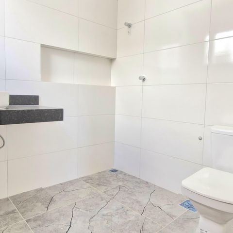 Casa à venda com 180m², 3 quartos e 2 vagas Casa à venda com 180m², 3 quartos e 2 vagasBanheiro da Suíte 1