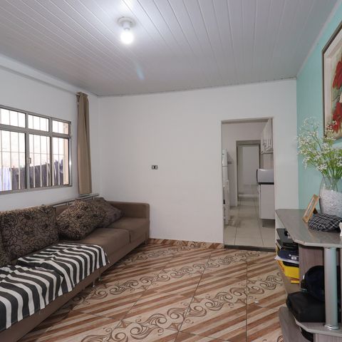 Casa à venda com 100m², 2 quartos e 1 vagaCasa 1 - Sala