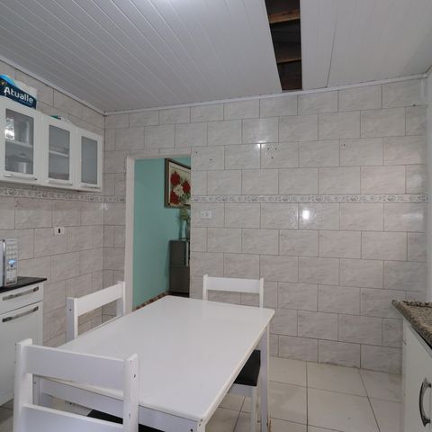 Casa à venda com 100m², 2 quartos e 1 vagaCasa 1 - Cozinha