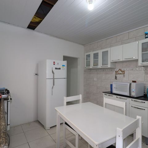 Casa à venda com 100m², 2 quartos e 1 vagaCasa 1 - Cozinha