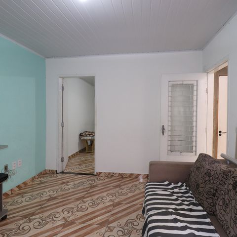 Casa à venda com 100m², 2 quartos e 1 vagaCasa 1 - Sala