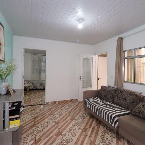 Casa à venda com 100m², 2 quartos e 1 vagaCasa 1 - Sala