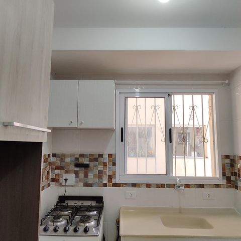 Apartamento à venda com 50m², 2 quartos e 1 vaga Apartamento à venda com 50m², 2 quartos e 1 vagaCozinha e Área de Serviço