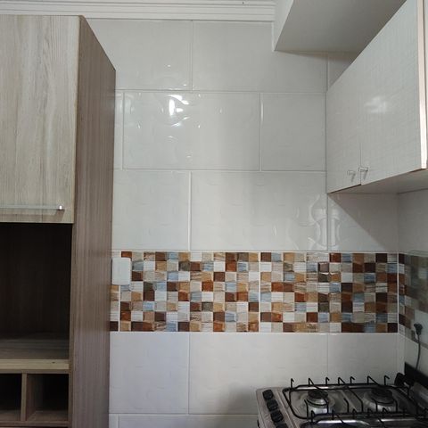 Apartamento à venda com 50m², 2 quartos e 1 vaga Apartamento à venda com 50m², 2 quartos e 1 vagaCozinha e Área de Serviço