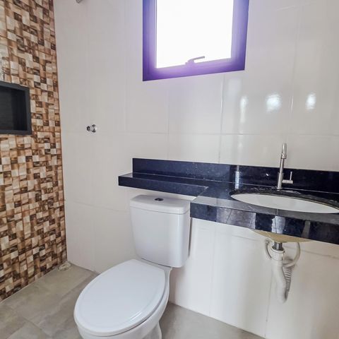 Casa à venda com 105m², 3 quartos e 2 vagas Casa à venda com 105m², 3 quartos e 2 vagasBanheiro da Suíte