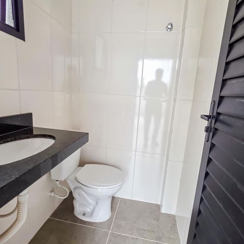 Casa à venda com 105m², 3 quartos e 2 vagas Casa à venda com 105m², 3 quartos e 2 vagasBanheiro de Serviço
