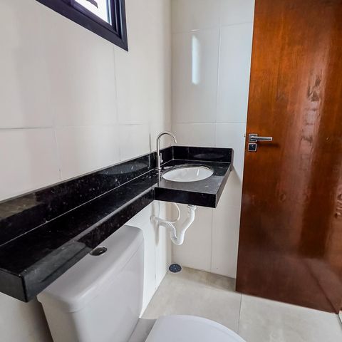 Casa à venda com 105m², 3 quartos e 2 vagas Casa à venda com 105m², 3 quartos e 2 vagasBanheiro da Suíte