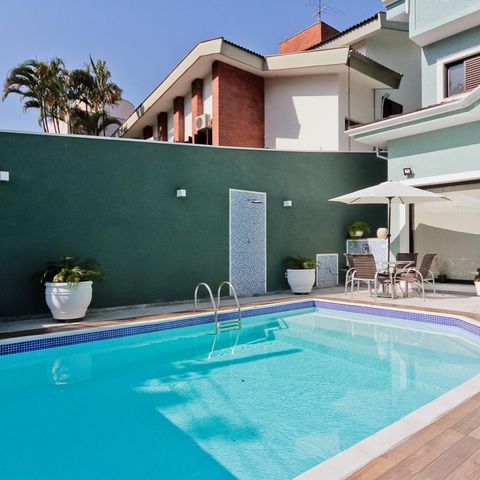 Casa à venda com 610m², 5 quartos e 10 vagasÁrea externa