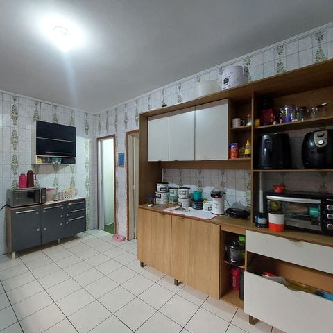 Casa à venda com 98m², 3 quartos e 3 vagas Casa à venda com 98m², 3 quartos e 3 vagasCozinha