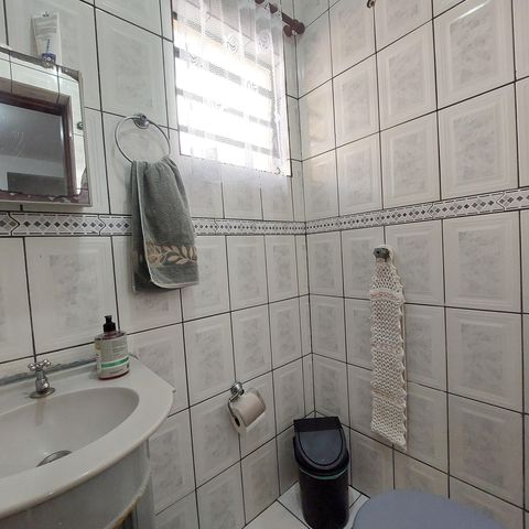 Casa à venda com 98m², 3 quartos e 3 vagas Casa à venda com 98m², 3 quartos e 3 vagasBanheiro 1