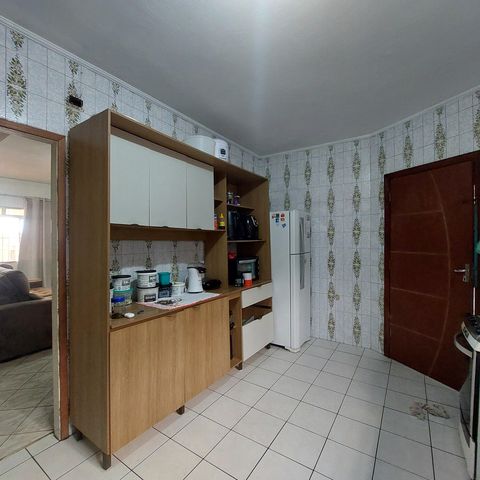 Casa à venda com 98m², 3 quartos e 3 vagas Casa à venda com 98m², 3 quartos e 3 vagasCozinha