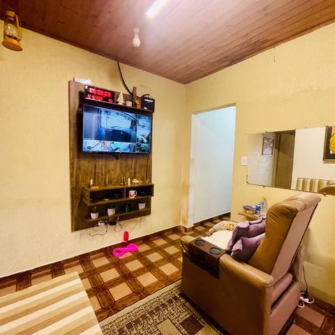 Casa à venda com 125m², 2 quartos e 2 vagas Casa à venda com 125m², 2 quartos e 2 vagasSala