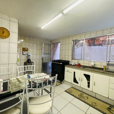 Casa à venda com 125m², 2 quartos e 2 vagas Casa à venda com 125m², 2 quartos e 2 vagasCozinha