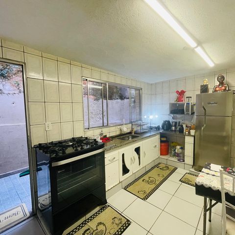 Casa à venda com 125m², 2 quartos e 2 vagas Casa à venda com 125m², 2 quartos e 2 vagasCozinha