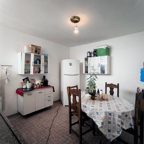 Casa à venda com 107m², 2 quartos e 2 vagas Casa à venda com 107m², 2 quartos e 2 vagasCozinha