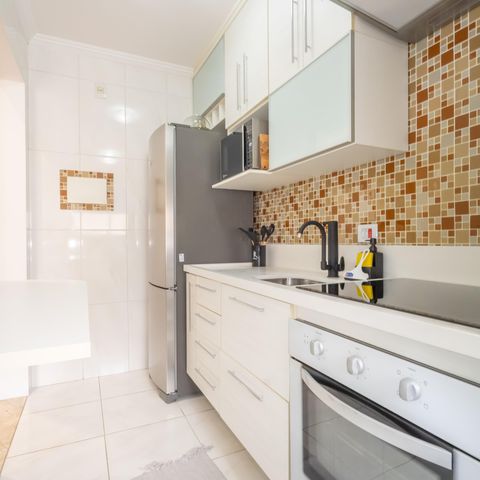 Apartamento à venda com 44m², 2 quartos e 1 vaga Apartamento à venda com 44m², 2 quartos e 1 vagaCozinha e Área de Serviço