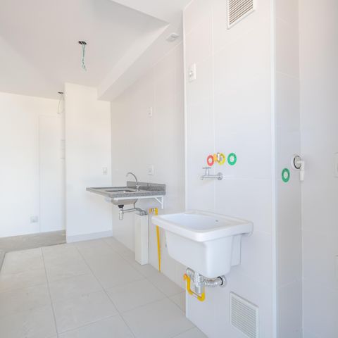 Apartamento à venda com 65m², 3 quartos e 2 vagas Apartamento à venda com 65m², 3 quartos e 2 vagasCozinha e Área de Serviço