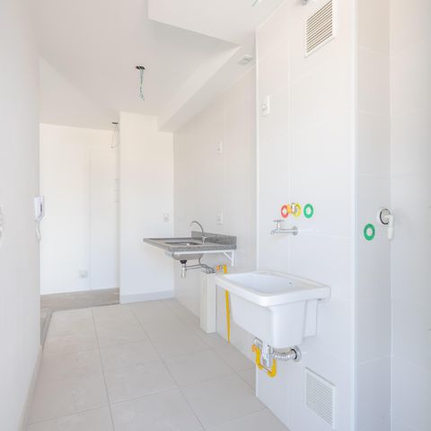 Apartamento à venda com 65m², 3 quartos e 2 vagas Apartamento à venda com 65m², 3 quartos e 2 vagasCozinha e Área de Serviço