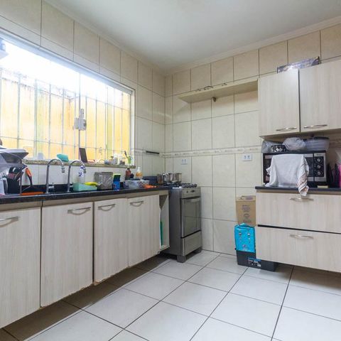 Casa à venda com 108m², 3 quartos e 3 vagas Casa à venda com 108m², 3 quartos e 3 vagasCozinha