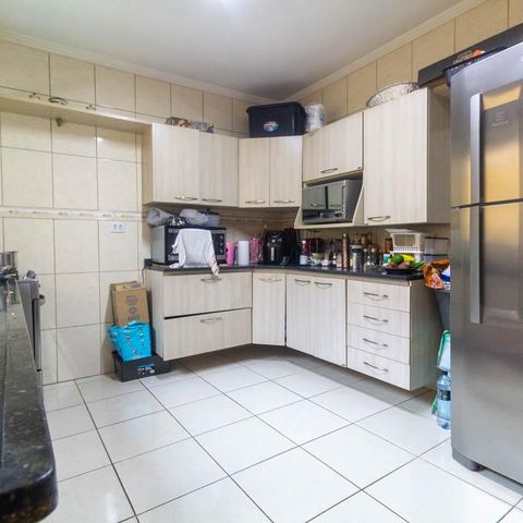 Casa à venda com 108m², 3 quartos e 3 vagas Casa à venda com 108m², 3 quartos e 3 vagasCozinha