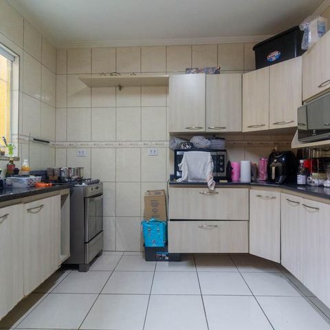 Casa à venda com 108m², 3 quartos e 3 vagas Casa à venda com 108m², 3 quartos e 3 vagasCozinha