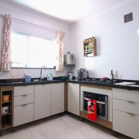 Casa à venda com 117m², 3 quartos e 3 vagas Casa à venda com 117m², 3 quartos e 3 vagasCozinha