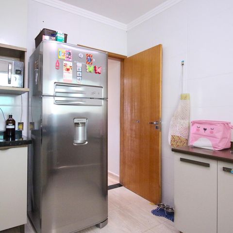 Casa à venda com 117m², 3 quartos e 3 vagas Casa à venda com 117m², 3 quartos e 3 vagasCozinha
