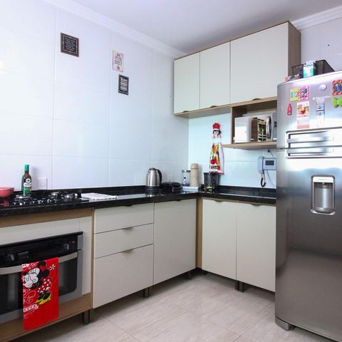 Casa à venda com 117m², 3 quartos e 3 vagas Casa à venda com 117m², 3 quartos e 3 vagasCozinha