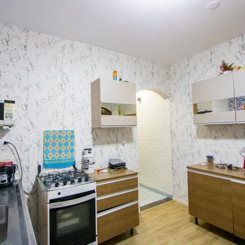 Casa à venda com 125m², 2 quartos e 2 vagas Casa à venda com 125m², 2 quartos e 2 vagasCozinha