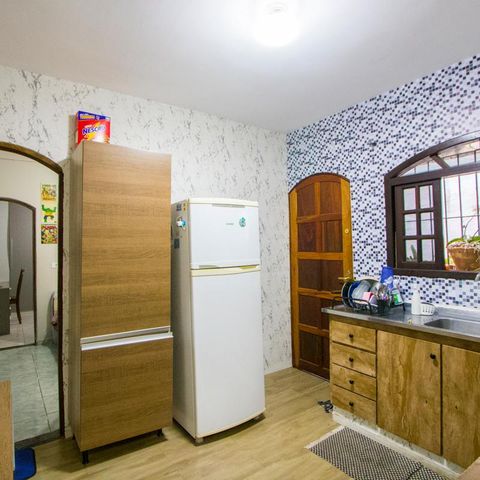 Casa à venda com 125m², 2 quartos e 2 vagas Casa à venda com 125m², 2 quartos e 2 vagasCozinha