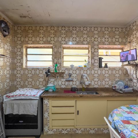 Casa à venda com 167m², 3 quartos e 2 vagas Casa à venda com 167m², 3 quartos e 2 vagasCozinha
