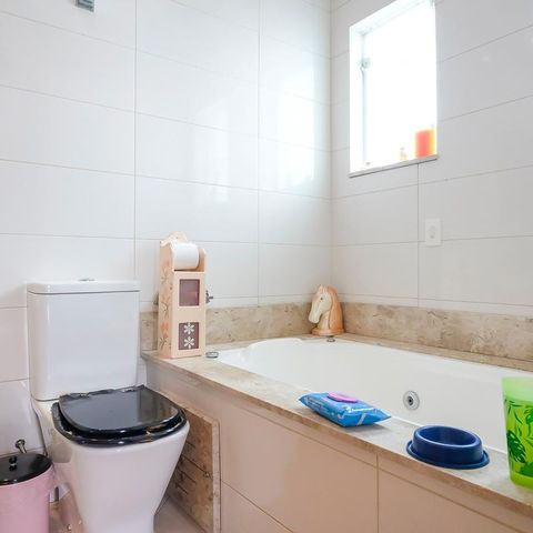 Casa à venda com 249m², 3 quartos e 3 vagasBanheiro da Suíte 1