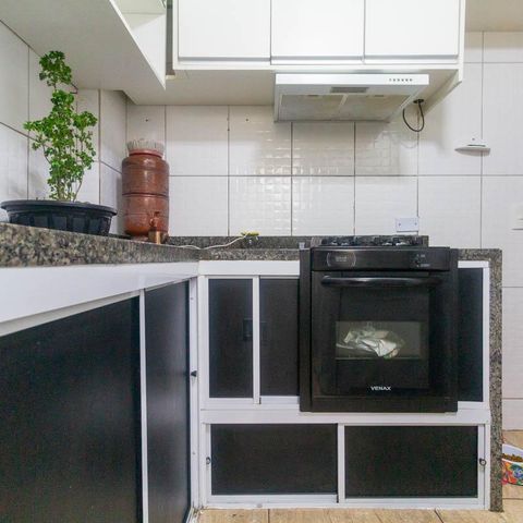 Apartamento à venda com 50m², 2 quartos e 1 vaga Apartamento à venda com 50m², 2 quartos e 1 vagaCozinha e Área de Serviço