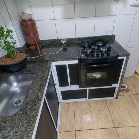 Apartamento à venda com 50m², 2 quartos e 1 vaga Apartamento à venda com 50m², 2 quartos e 1 vagaCozinha e Área de Serviço