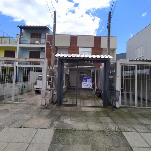 Casa à venda com 82m², 2 quartos e 2 vagas Casa à venda com 82m², 2 quartos e 2 vagasFachada