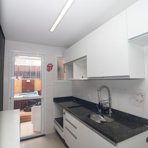 Casa à venda com 82m², 2 quartos e 2 vagas Casa à venda com 82m², 2 quartos e 2 vagasCozinha