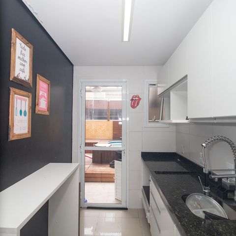 Casa à venda com 82m², 2 quartos e 2 vagas Casa à venda com 82m², 2 quartos e 2 vagasCozinha