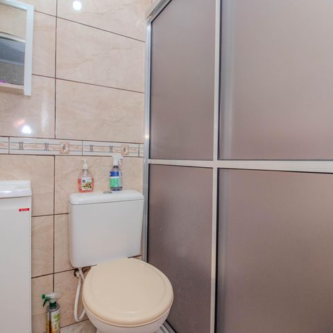 Casa à venda com 65m², 2 quartos e 1 vaga Casa à venda com 65m², 2 quartos e 1 vagaBanheiro