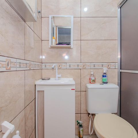 Casa à venda com 65m², 2 quartos e 1 vaga Casa à venda com 65m², 2 quartos e 1 vagaBanheiro