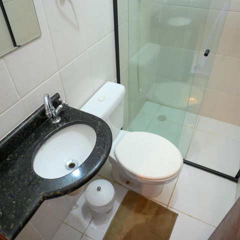 Casa à venda com 125m², 2 quartos e 2 vagas Casa à venda com 125m², 2 quartos e 2 vagasBanheiro de Serviço