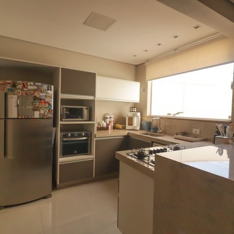 Casa à venda com 165m², 3 quartos e 2 vagas Casa à venda com 165m², 3 quartos e 2 vagasCozinha e Área de Serviço