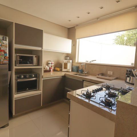 Casa à venda com 165m², 3 quartos e 2 vagas Casa à venda com 165m², 3 quartos e 2 vagasCozinha e Área de Serviço