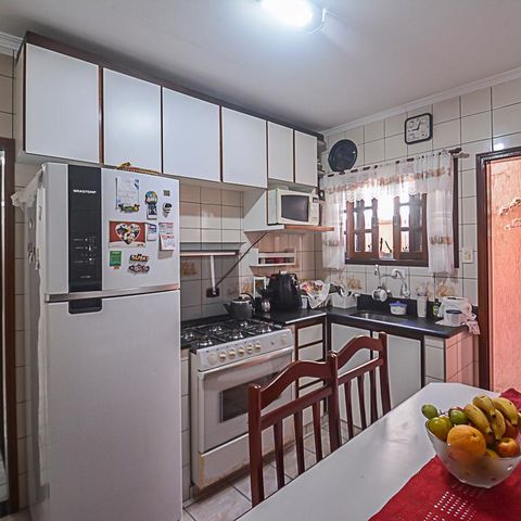 Casa à venda com 137m², 3 quartos e 2 vagas Casa à venda com 137m², 3 quartos e 2 vagasCozinha