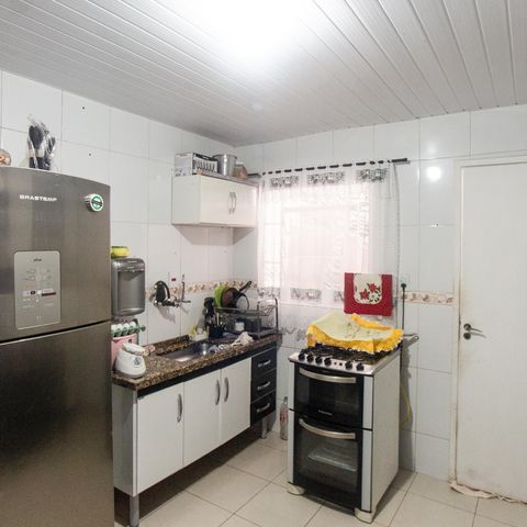 Casa à venda com 105m², 2 quartos e 2 vagas Casa à venda com 105m², 2 quartos e 2 vagasCozinha
