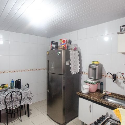 Casa à venda com 105m², 2 quartos e 2 vagas Casa à venda com 105m², 2 quartos e 2 vagasCozinha