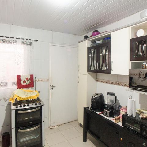 Casa à venda com 105m², 2 quartos e 2 vagas Casa à venda com 105m², 2 quartos e 2 vagasCozinha