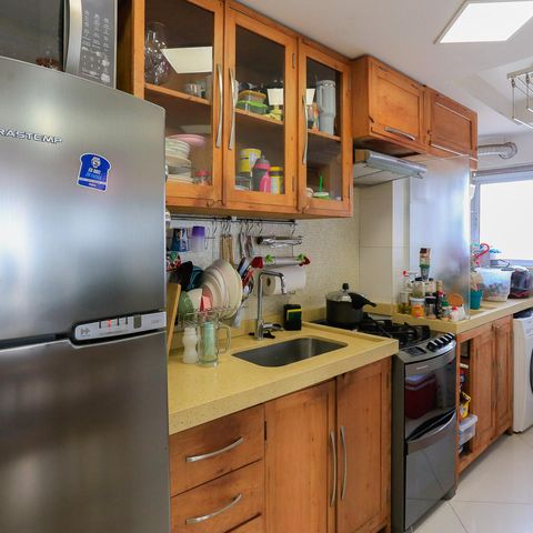 Apartamento à venda com 60m², 2 quartos e 1 vaga Apartamento à venda com 60m², 2 quartos e 1 vagaCozinha e Área de Serviço