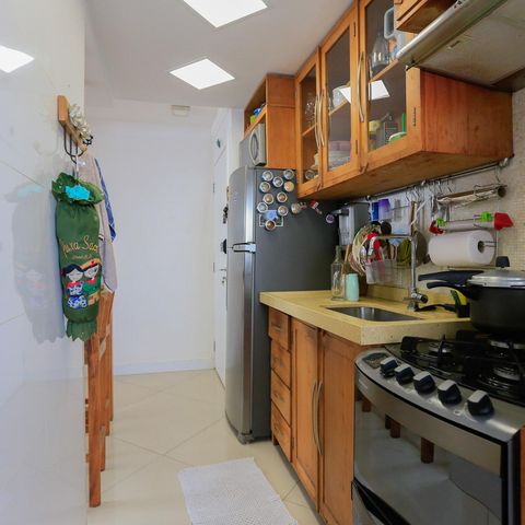 Apartamento à venda com 60m², 2 quartos e 1 vaga Apartamento à venda com 60m², 2 quartos e 1 vagaCozinha e Área de Serviço
