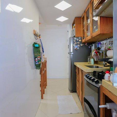 Apartamento à venda com 60m², 2 quartos e 1 vaga Apartamento à venda com 60m², 2 quartos e 1 vagaCozinha e Área de Serviço